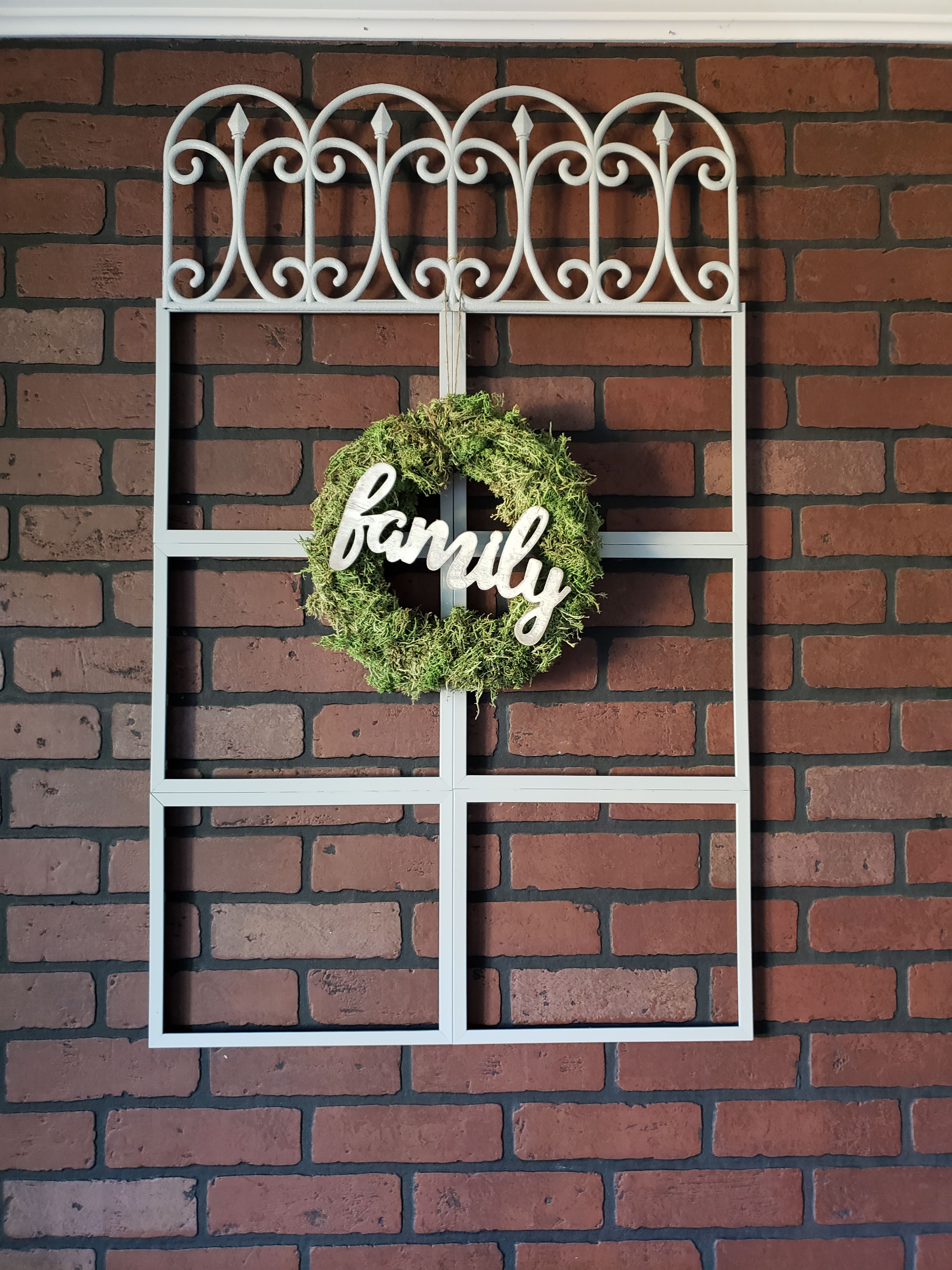 Completed farmhouse window with wreath attached 