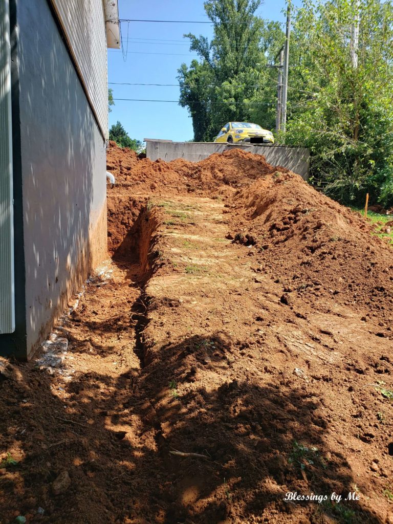 Trench beside the house