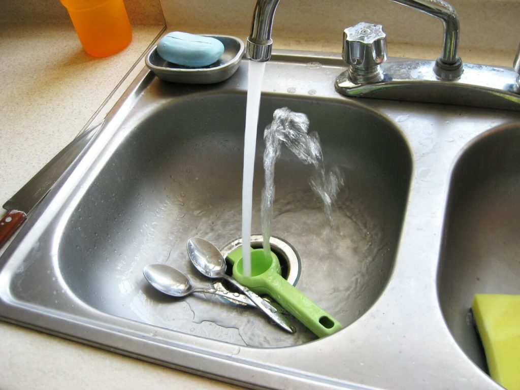 Unclog a sink drain with vinegar