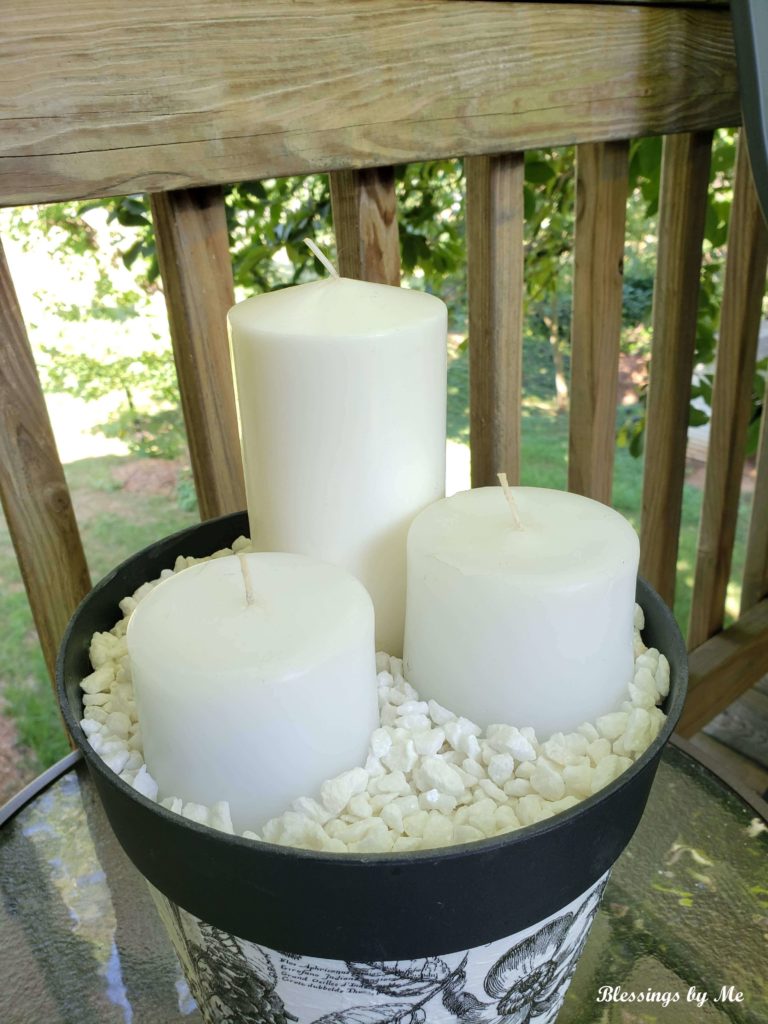 add candles to the repurposed flower pot