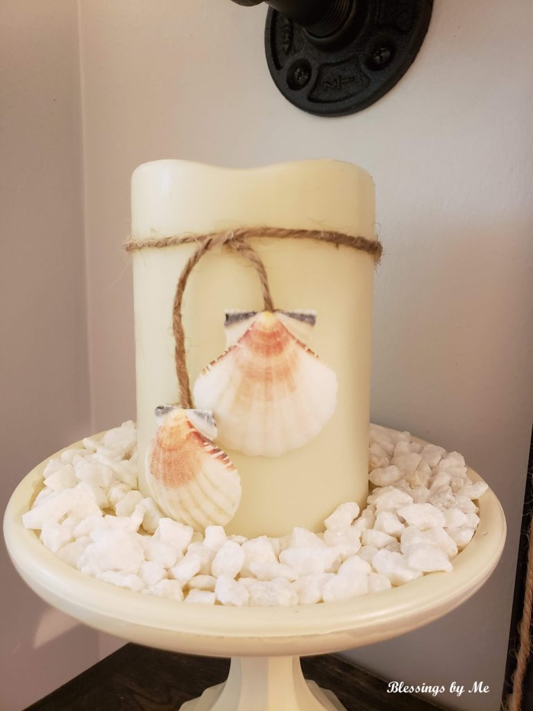 use rocks and a candle holder 