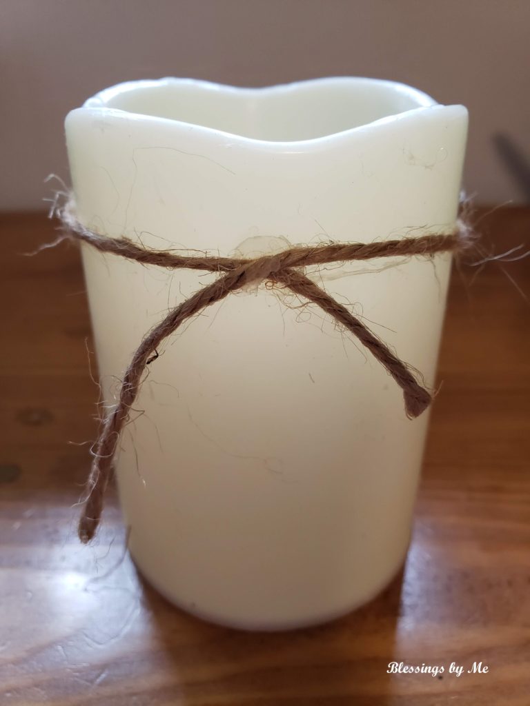 hot glue jute twine to the candle