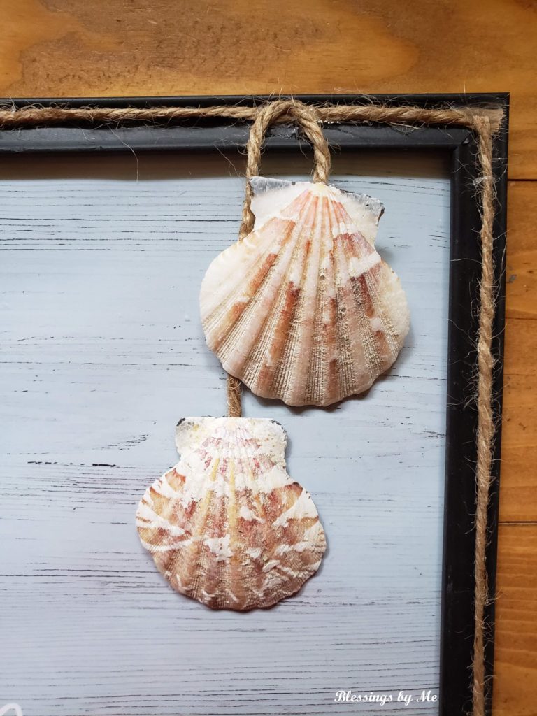 glue the seashells to the end of the jute