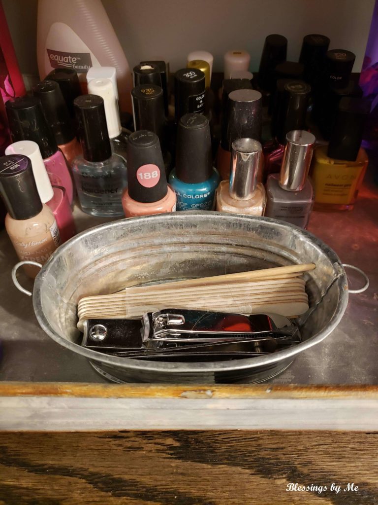 small galvanized bucket for organizing nail clippers and files