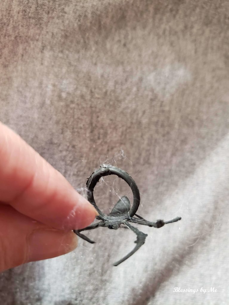 cut the ring off the plastic spider