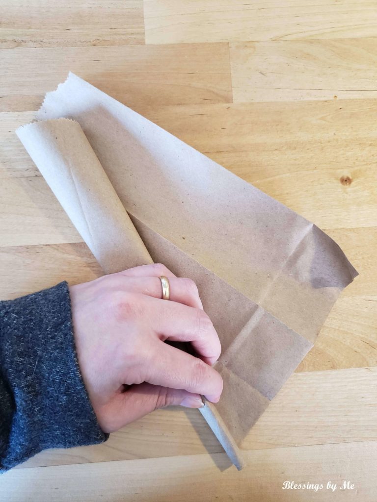 Roll the bag into a cone shape